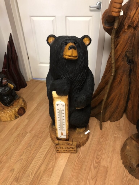 chainsaw carved bear with thermometer