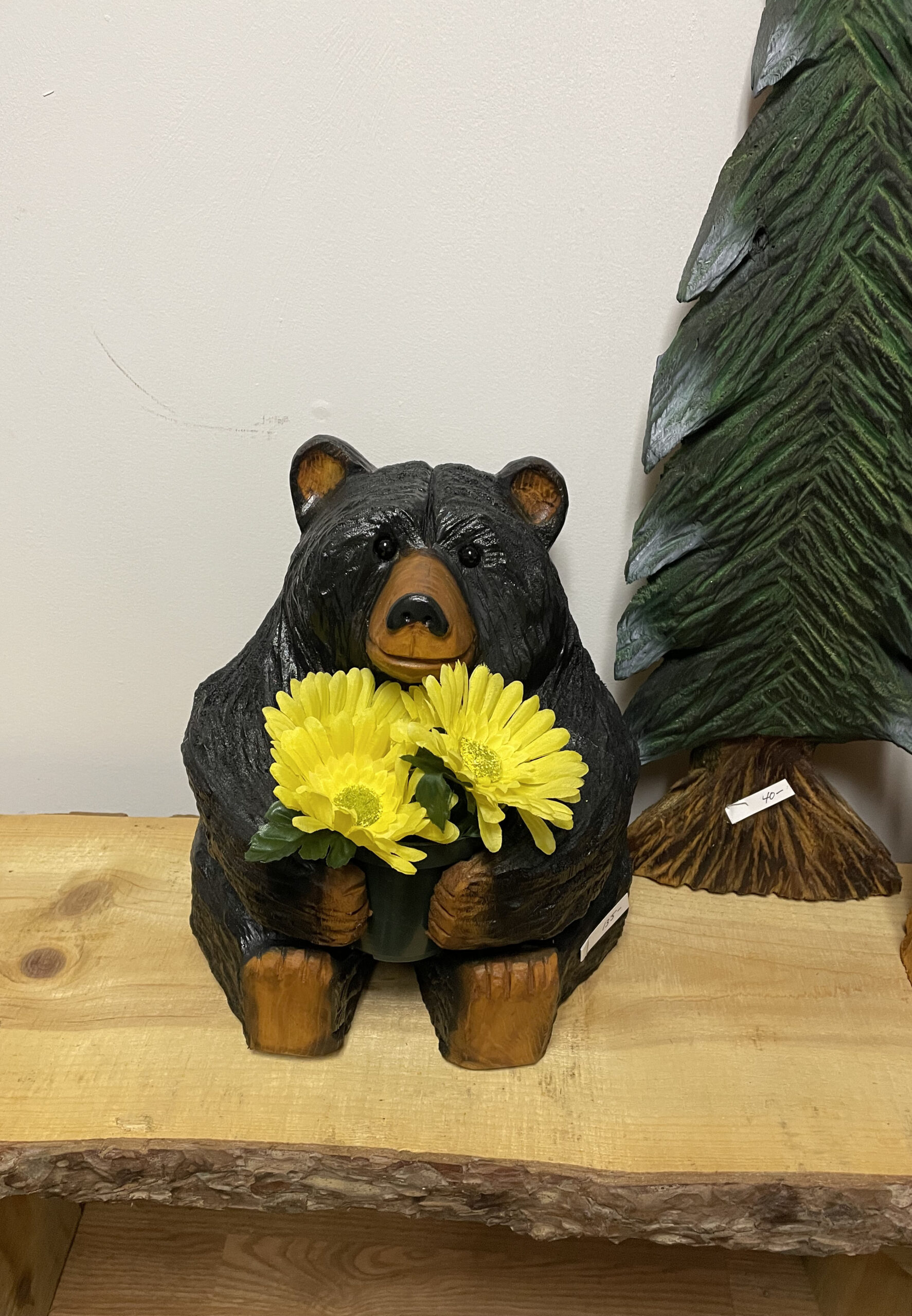 chainsaw carved bear flower pot