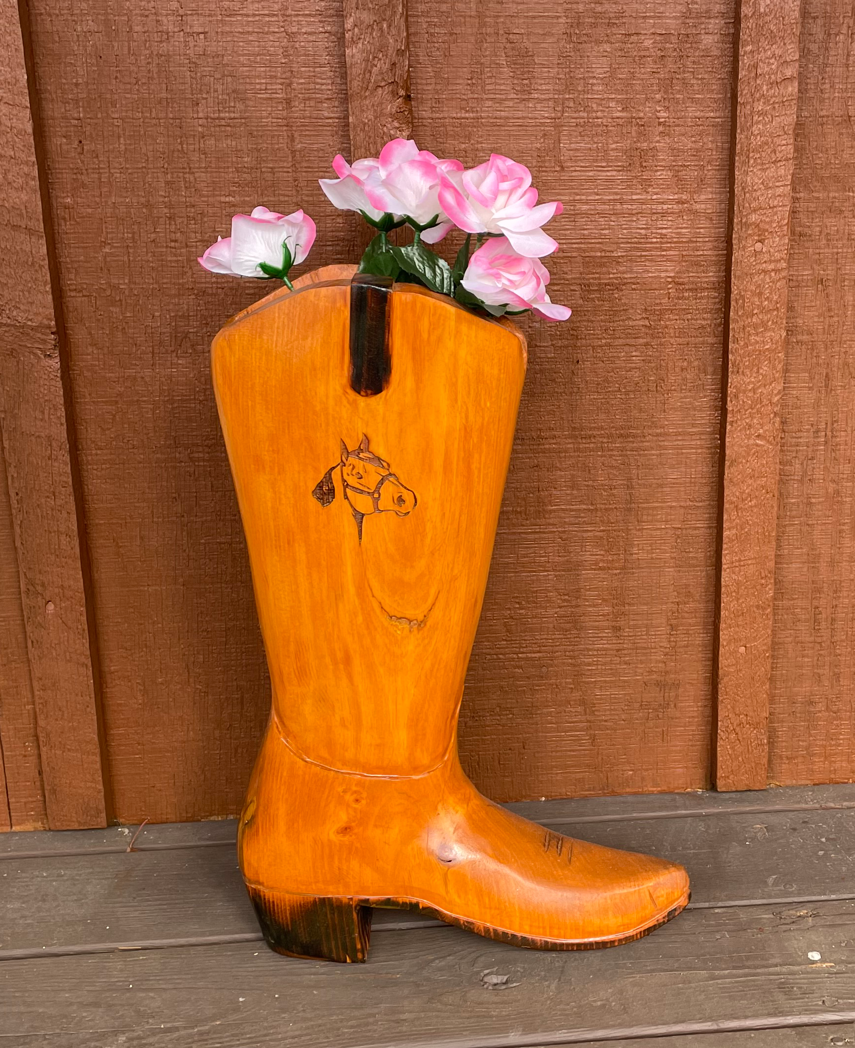 chainsaw carved cowboy boot